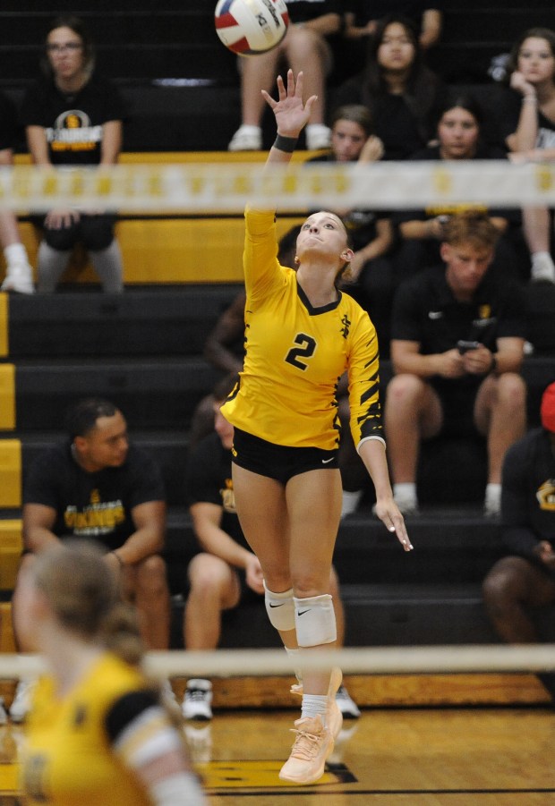 St. Laurence's Natalie Martinez (2) follows through on her serve against Marian Catholic during a nonconference match Wednesday, Sept. 4, 2024 in Burbank, IL. (Steve Johnston/Daily Southtown)