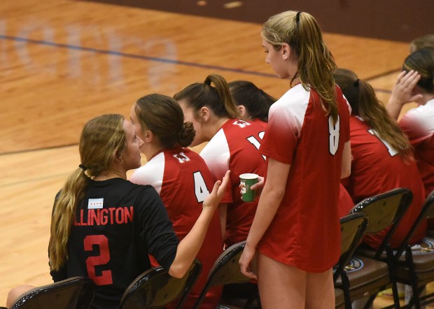 Marist's Bella Bullington (2) talks with Taylor Berg (8) when Berg came out for a break during the third set against Joliet Catholic during an East Suburban Catholic Conference volleyball match Tuesday, Sept. 17, 2024 in Joliet, IL. (Steve Johnston/Daily Southtown)