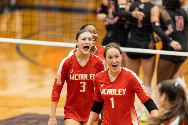 Mother McAuley's Cayla Prohaska (3) shouts with joy after a point against Marist during a nonconference game in Chicago on Thursday, Sept. 26, 2024. (Vincent D. Johnson / Daily Southtown)