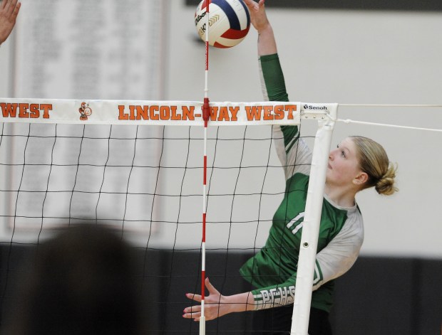 Providence's Abbey Knight (11) spikes the ball against Lincoln-Way West Tuesday, Sept. 3, 2024 in New Lenox, IL. (Steve Johnston/Daily Southtown)