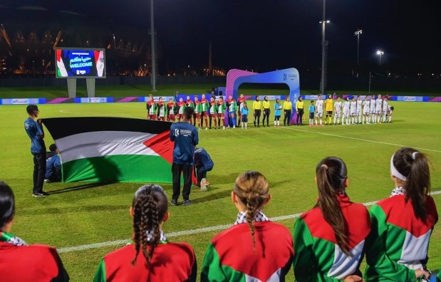 The Palestinian National Soccer Team takes the field earlier this year during the West Asian Women's Football Championship earlier this year in Saudi Arabia. (Guevara Al-Sheikh)