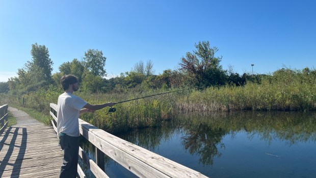 Homewood resident Jake Quirke fishes out of Prairie Lake on the Izaak Walton Preserve Sept. 25, 2024. (Samantha Moilanen/Daily Southtown)