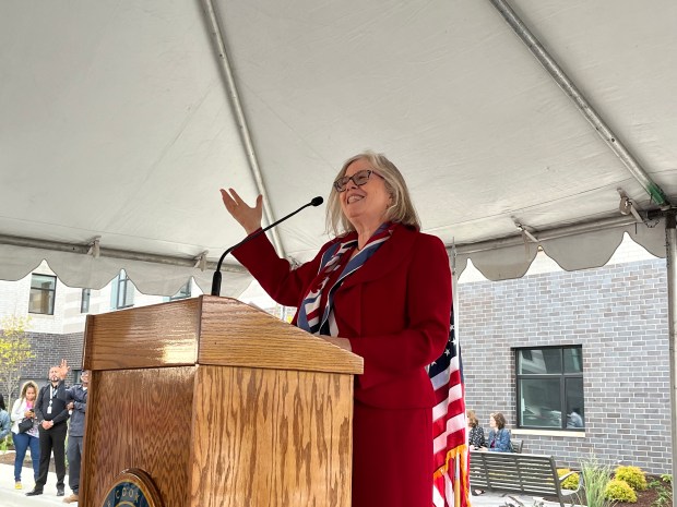 Kristin Faust, executive director of the Illinois Housing Development Authority, speaks at a ribbon-cutting ceremony Sept. 13, 2024, for Otto Veterans Square, a housing development in Chicago Heights. (Samantha Moilanen/Daily Southtown)