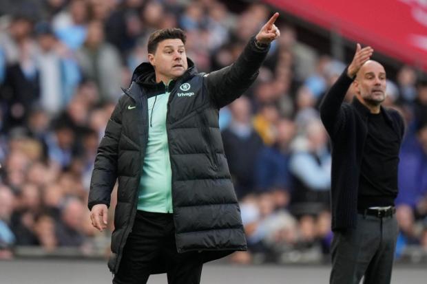 FILE - Chelsea's head coach Mauricio Pochettino, left, and Manchester City's head coach Pep Guardiola gesture during the English FA Cup semifinal soccer match between Manchester City and Chelsea at Wembley stadium in London, Saturday, April 20, 2024. (AP Photo/Alastair Grant)