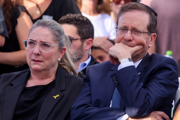 Israel's President Isaac Herzog and his wife Michal attend the funeral of Israeli-American hostage Hersh Goldberg-Polin, who was killed in Hamas captivity in the Gaza Strip, in Jerusalem, Sept. 2, 2024. (Gil Cohen-Magen/AP)