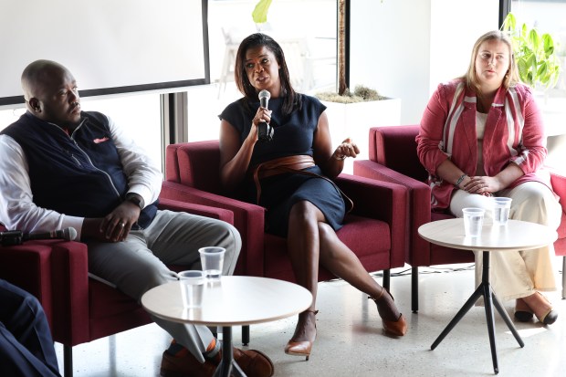 Cook County Chief Public Defender Sharone R. Mitchell Jr., from left, Cook County State's Attorney Kim Foxx and Chicago Alliance Against Sexual Exploitation Policy Director Madeleine Behr participate in a panel discussion on the first year of the Pretrial Fairness Act on Sept. 11, 2024 in Chicago. (Terrence Antonio James/Chicago Tribune)