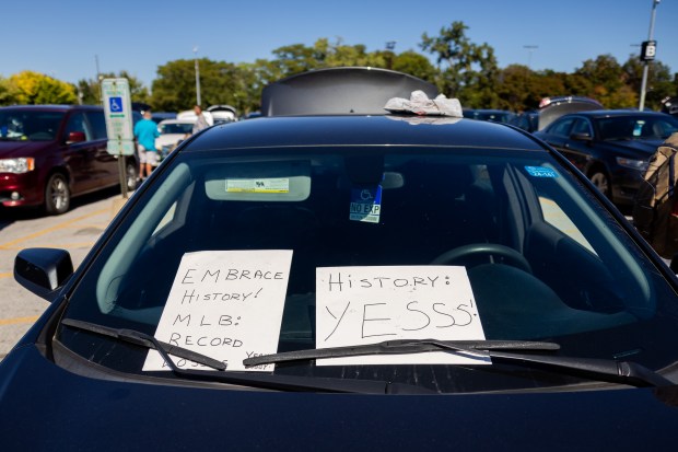 People tailgate outside the Guaranteed Rate Field before a game against the Los Angeles Angels in Chicago on Sept. 26, 2024. Sitting on a record-tying 120 losses, the Sox's next loss will make them the losingest team of the modern era. (Tess Crowley/Chicago Tribune)