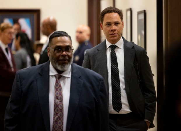 Ald. Matt Martin, 47th, right, arrives for a City Council meeting with Ald. Chris Taliaferro, 29th, on March 20, 2024, at City Hall. (Brian Cassella/Chicago Tribune)