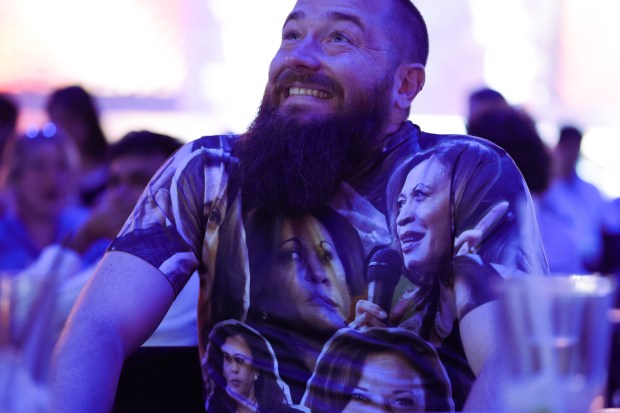 A man wears a T-shirt featuring Vice President Kamala Harris as he watches the presidential debate during a debate watch party at Penn Social on Sept. 10, 2024 in Washington, DC. Democratic presidential nominee, U.S. Vice President Kamala Harris and Republican presidential nominee, former President Donald Trump face off in their first debate Tuesday evening at The National Constitution Center in Philadelphia, Pennsylvania. (Alex Wong/Getty)