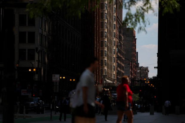 Buildings along South Dearborn Street are lit by the sun in the Loop on Sept. 5, 2024. (Eileen T. Meslar/Chicago Tribune)