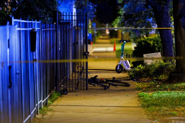 A bike sits on the ground at the scene where a 24-year-old man was shot on the 1300 block of North Rockwell during the Labor Day holiday Monday Sept. 2, 2024, in Chicago. (Armando L. Sanchez/Chicago Tribune)