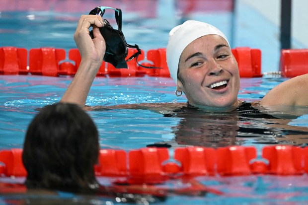 Palestine's Valerie Tarazi reacts after competing in a heat of the women's 200m individual medley swimming event during the Paris 2024 Olympic Games at the Paris La Defense Arena in Nanterre on Aug. 2, 2024. (Jonathan Nackstrand/AFP Getty)