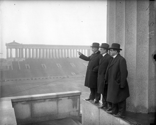 Cardinal George Mundelein, from left, the Rev,. William R. Griffin, and C.G. Guill look over Soldier Field in 1925 in preparation for the upcoming 28th International Eucharistic Congress. The large, open-air Mass was held at Soldier Field in June 1926. (Chicago Herald and Examiner)