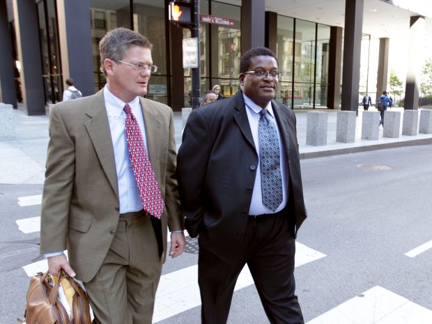 Former Chicago police Sgt. Ronald Watts, right, leaves the Dirksen Courthouse after being sentenced to 22 months in prison, on Oct. 9, 2013. (Phil Velasquez/Chicago Tribune)