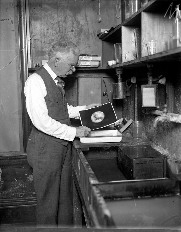 George C. Blakeslee, chief photographer at Yerkes Observatory in Williams Bay, Wisconsin, circa 1926. The observatory boasted a collection of over 170,000 photographic plates. (Chicago Herald and Examiner)