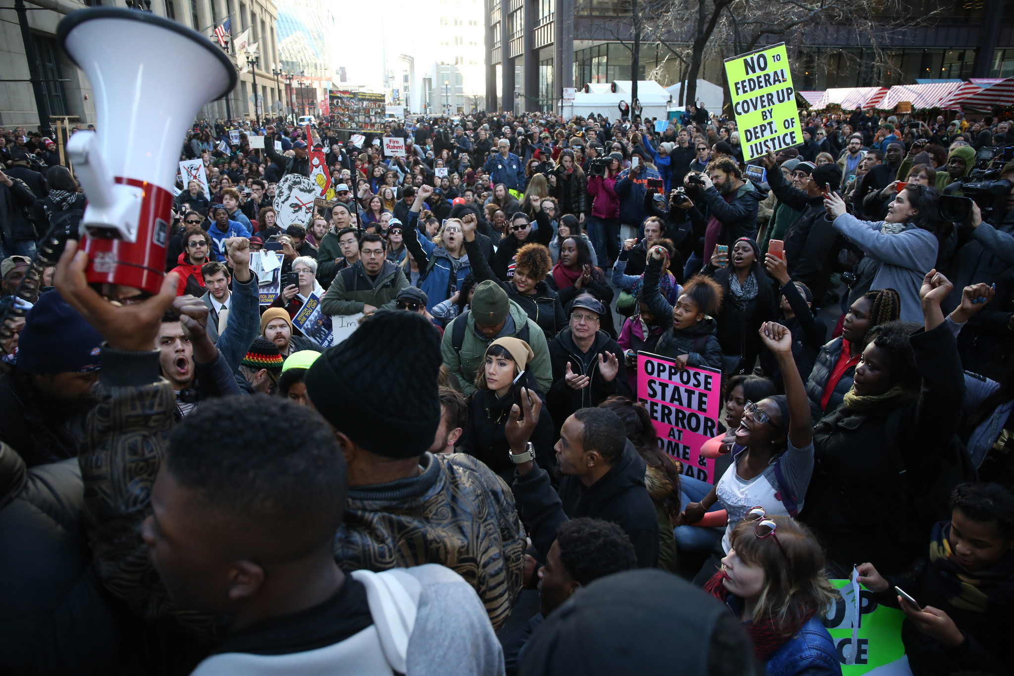 Protesters block traffic at Washington and Clark streets on Dec. 9,...