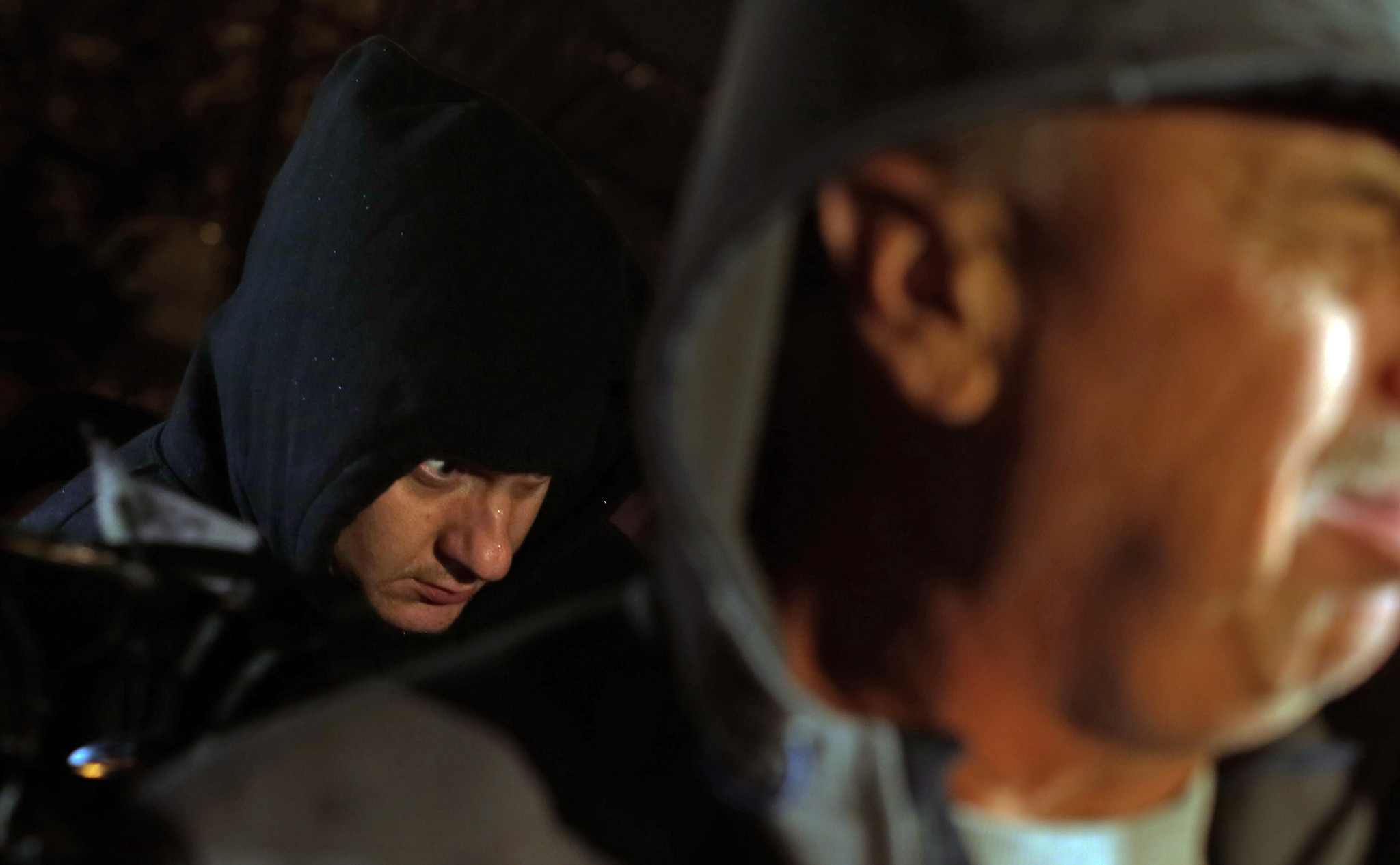 Jason Van Dyke, left, leaves the Cook County Jail at...