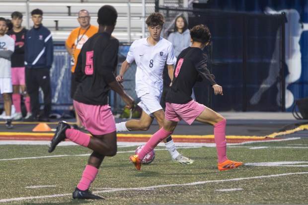 Bartlett's Oliver Kosciolek (8) goes on a run against West Aurora during an Upstate Eight conference game in Aurora on Tuesday, Oct. 1, 2024. (Troy Stolt / The Beacon-News)