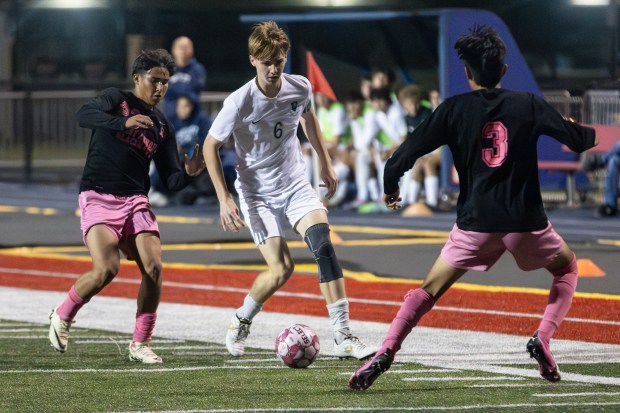 Bartlett's Jack Conner (6) dribbles the ball against West Aurora during an Upstate Eight conference game in Aurora on Tuesday, Oct. 1, 2024. (Troy Stolt / The Beacon-News)