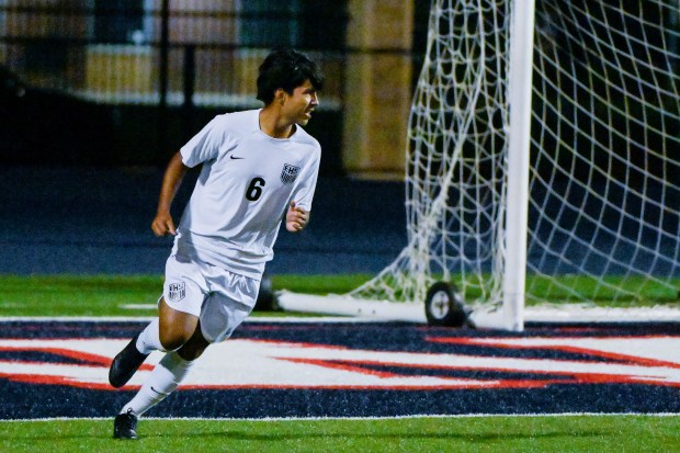 Elgin's Alexander Villarruel (6) celebrates his second half goal against West Aurora in Aurora on Tuesday, Oct. 8, 2024. (Mark Black / The Beacon-News)