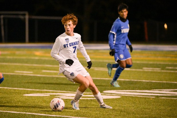 St. Charles North's Nolan Schoenholz (7) controls the ball against Geneva on Tuesday, Oct. 15, 2024. (Mark Black / for the Beacon-News)