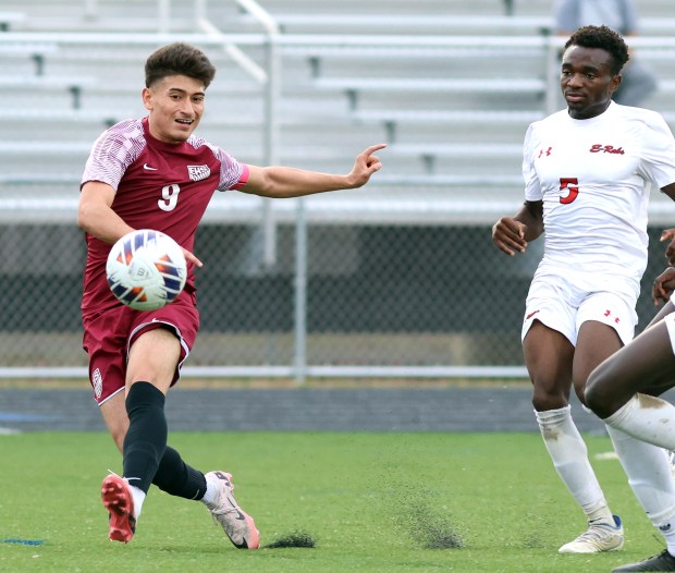 Elgin's Beto Gaytan fires the ball towards at the goal during the 3A Streamwood Sectional semifinals soccer game against Rockford East in Streamwood on Wednesday, Oct. 30, 2024.(James C. Svehla / for the Beacon-News)