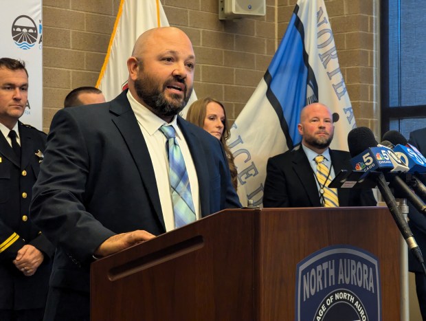 During a press conference Wednesday, North Aurora Police Det. Ryan Peat discusses evidence linking suspected serial killer Bruce Lindahl to the killing of Kathy Halle of North Aurora in 1979. (R. Christian Smith / The Beacon-News)