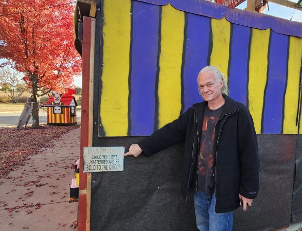 Elburn resident Mike Kothe said he enjoys putting up the Kamme-O-Circus haunted house in the front yard of his home every year. The attraction includes interactive displays, live performers, animatronics and more. (David Sharos / For The Beacon-News)