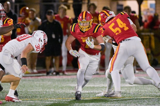 Batavia's Greyson Kelly (7) runs the ball against South Elgin during a game at home on Friday, Sept. 6, 2024. (Mark Black / The Beacon-News)