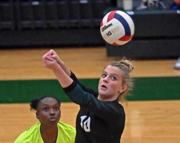 Waubonsie Valley's Chloe Gollaher returns a shot over her shoulder. Waubonsie Valley defeated Metea Valley in girls volleyball, Thursday, Oct. 10, 2024, in Aurora, Illinois. (Jon Langham/for the Beacon-News)