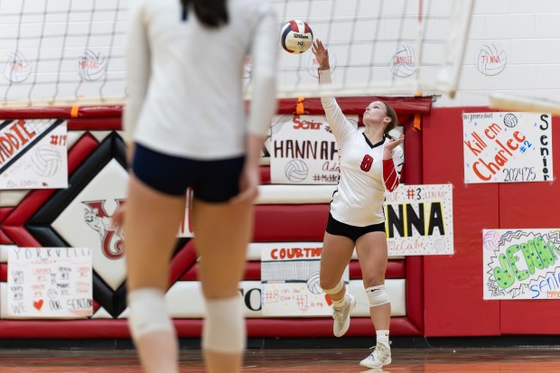 Yorkville's Courtney Clabough (8) serves the ball against Oswego East during a Southwest Prairie Conference game in Yorkville on Thursday, Oct. 24, 2024. (Troy Stolt / for the Beacon-News)