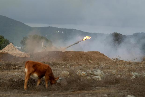 An Israeli mobile artillery unit fires a shell from northern Israel towards Lebanon, Wednesday, Oct. 2, 2024. (AP Photo/Baz Ratner)