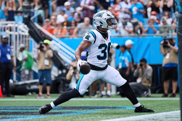 Panthers running back Chuba Hubbard reacts after scoring a touchdown against the Bengals on Sep. 29, 2024, in Charlotte, N.C. (AP Photo/Brian Westerholt)