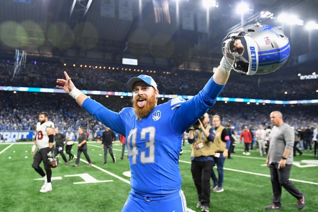 Detroit Lions long snapper Jake McQuaide reacts following an NFL football NFC divisional playoff game against the Tampa Bay Buccaneers, Sunday, Jan. 21, 2024, in Detroit. The Lions won 31-23. (AP Photo/Jose Juarez)