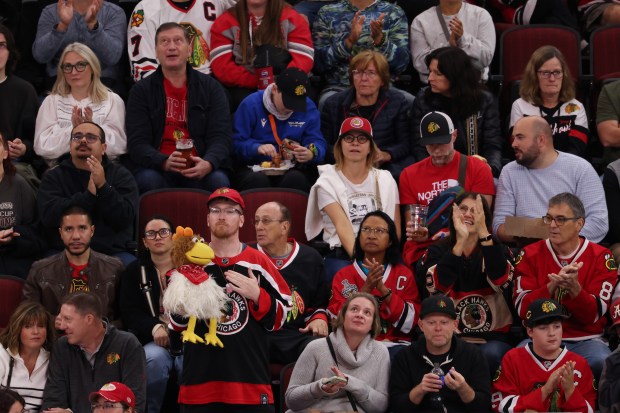 Fans applaud during a stoppage in the second period of a preseason game between the Blackhawks and Wild on Oct. 4, 2024, at the United Center. (John J. Kim/Chicago Tribune)