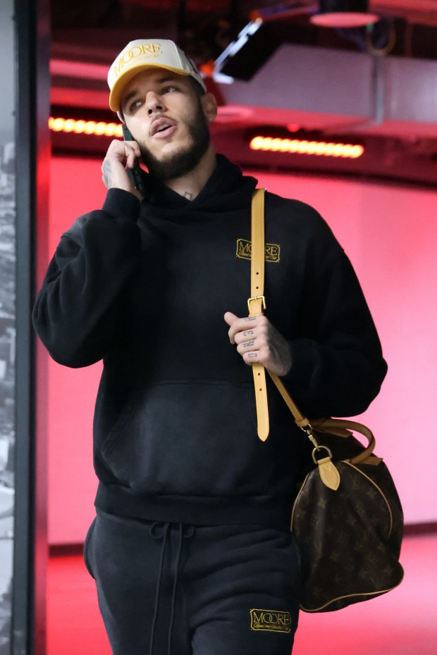 Bulls guard Lonzo Ball arrives at the United Center in Chicago before the start of a game against the Timberwolves on Oct. 16, 2024. (Terrence Antonio James/Chicago Tribune)