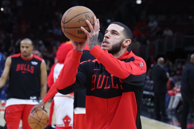 Bulls guard Lonzo Ball warms up at the United Center in Chicago before the start of a game against the Timberwolves on Oct. 16, 2024. (Terrence Antonio James/Chicago Tribune)