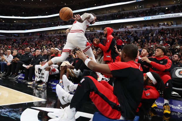 Bulls guard Lonzo Ball (2) flips a loose ball back into play in the first half of a game against the Timberwolves at the United Center in Chicago on Oct. 16, 2024. (Terrence Antonio James/Chicago Tribune)