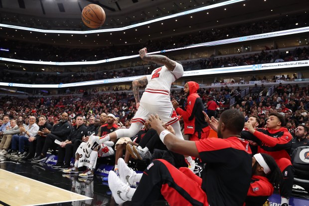 Bulls guard Lonzo Ball (2) flips a loose ball back into play in the first half of a game against the Timberwolves at the United Center in Chicago on Oct. 16, 2024. (Terrence Antonio James/Chicago Tribune)