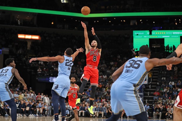 Zach LaVine shoots over the Grizzlies' Desmond Bane during the second half at FedExForum on Oct. 28, 2024 in Memphis. (Photo by Justin Ford/Getty Images)