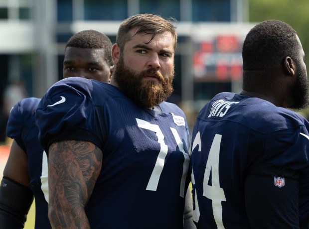 Bears offensive lineman Ryan Bates waits in line during warmups at training camp on July 26, 2024, in Lake Forest. (Stacey Wescott/Chicago Tribune)