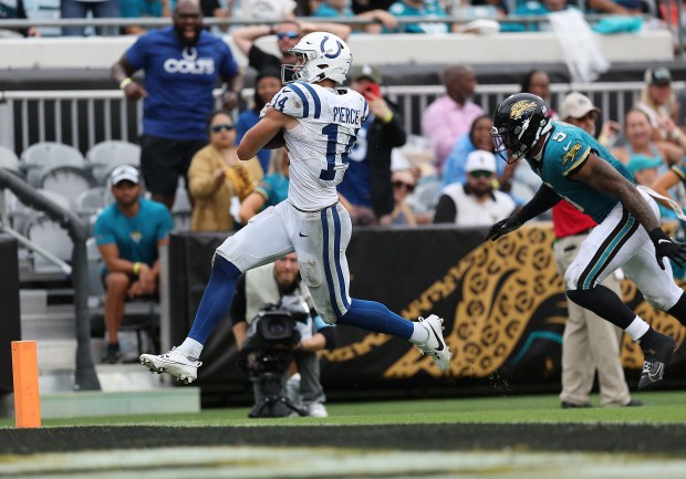 Alec Pierce of the Colts catches a touchdown pass during the fourth quarter against the Jaguars on Oct. 6, 2024, in Jacksonville, Fla. (Mike Carlson/Getty Images)