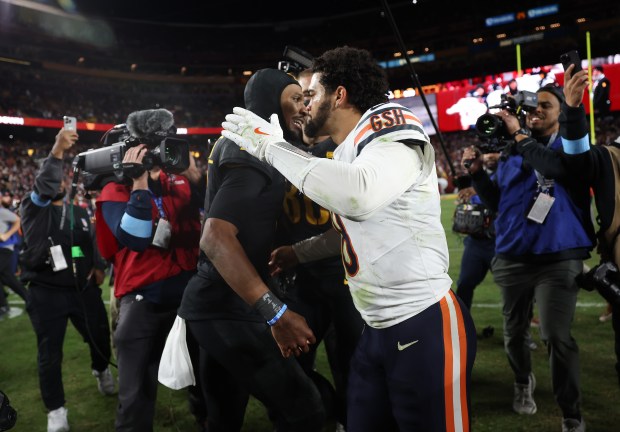 Bears quarterback Caleb Williams, right, congratulates Commanders quarterback Jayden Daniels on an 18-15 win on Oct. 27, 2024, in Landover, Md. (John J. Kim/Chicago Tribune)