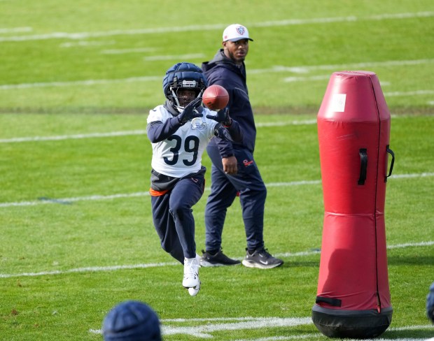 Bears cornerback Josh Blackwell catches a ball during practice Thursday, Oct. 10, 2024, in Ware, England. (AP Photo/Sean Ryan)