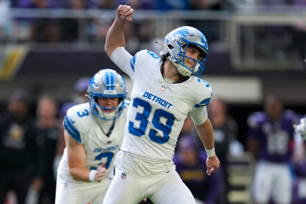 Lions kicker Jake Bates celebrates his 44-yard field goal against the Vikings on Oct. 20, 2024, in Minneapolis. (AP Photo/Abbie Parr)