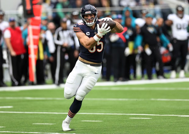 Bears tight end Cole Kmet catches a pass before running it in for a touchdown in the second quarter against the Jaguars at Tottenham Hotspur Stadium in London on Oct. 13, 2024. (Chris Sweda/Chicago Tribune)