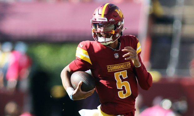 Commanders quarterback Jayden Daniels runs the ball against the Browns on Oct. 6, 2024, in Landover, Md. (AP Photo/Daniel Kucin Jr.)