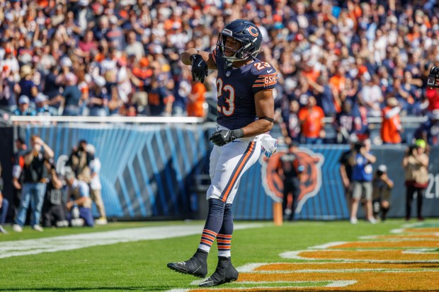 Bears running back Roschon Johnson celebrates after scoring a touchdown during the second quarter against the Panthers at Soldier Field on Oct. 6, 2024. (Armando L. Sanchez/Chicago Tribune)