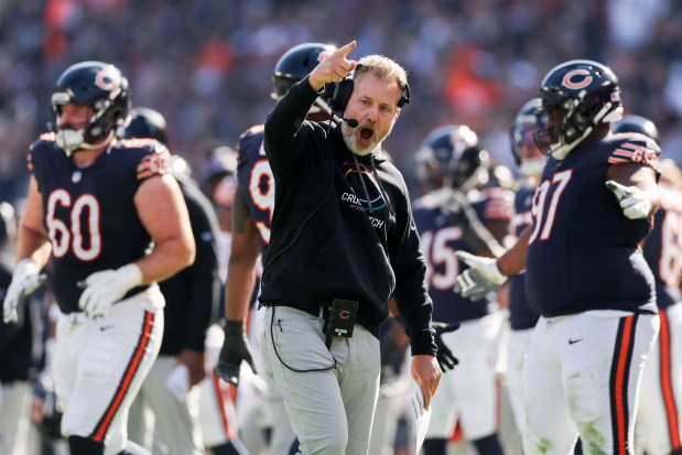 Bears coach Matt Eberflus points toward the end zone after cornerback Kyler Gordon recovered a fumble during the fourth quarter against the Panthers on Sunday, Oct. 6, 2024, at Soldier Field. (Armando L. Sanchez/Chicago Tribune)