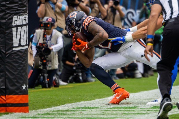 Bears wide receiver DJ Moore secures a 9-yard touchdown reception during the third quarter against the Rams on Sept. 29, 2024, at Soldier Field. (Tess Crowley/Chicago Tribune)